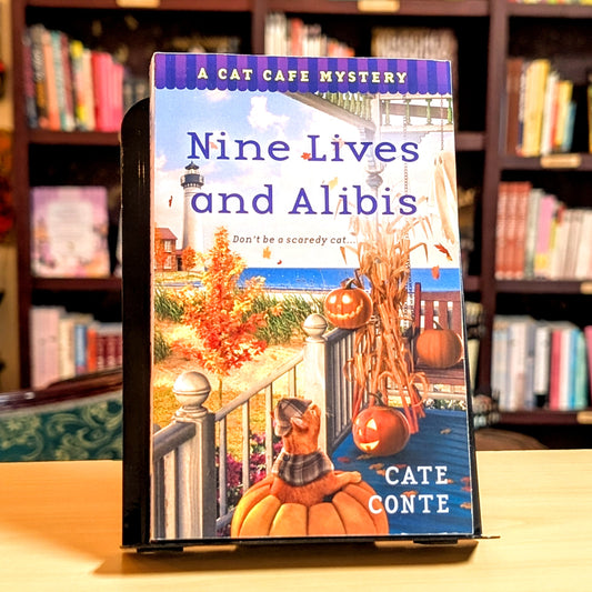 Nine Lives and Alibis: A Cat Cafe Mystery (Cat Cafe Mystery Series, 7)