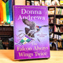 The Falcon Always Wings Twice: A Meg Langslow Mystery (Meg Langslow Mysteries, 27)