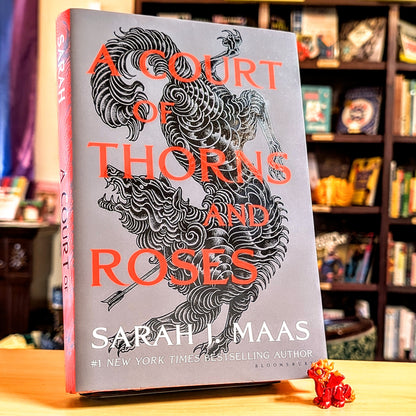 A Court of Thorns and Roses (A Court of Thorns and Roses, 1)
