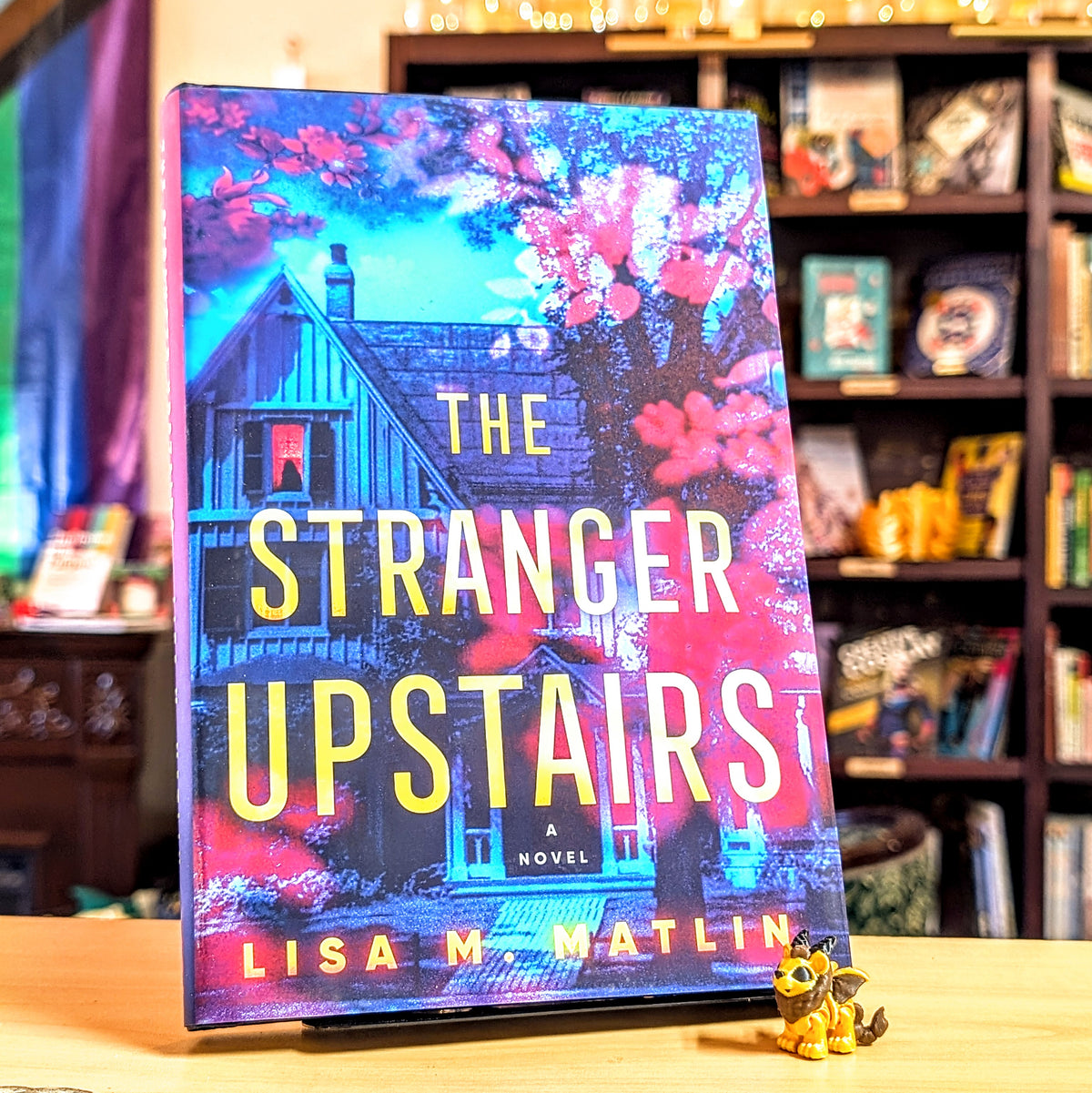The Stranger Upstairs: A Novel